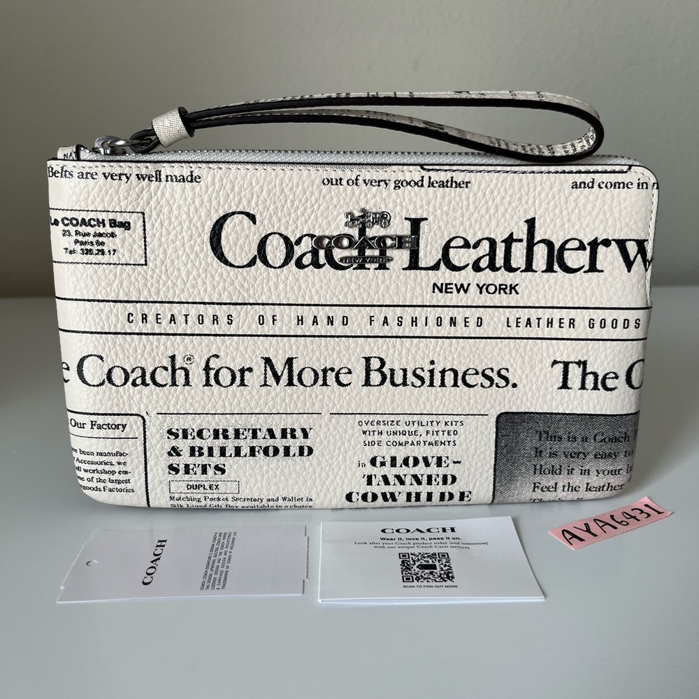 Coach Large Corner Zip Wristlet With Newspaper Print🎈🎈